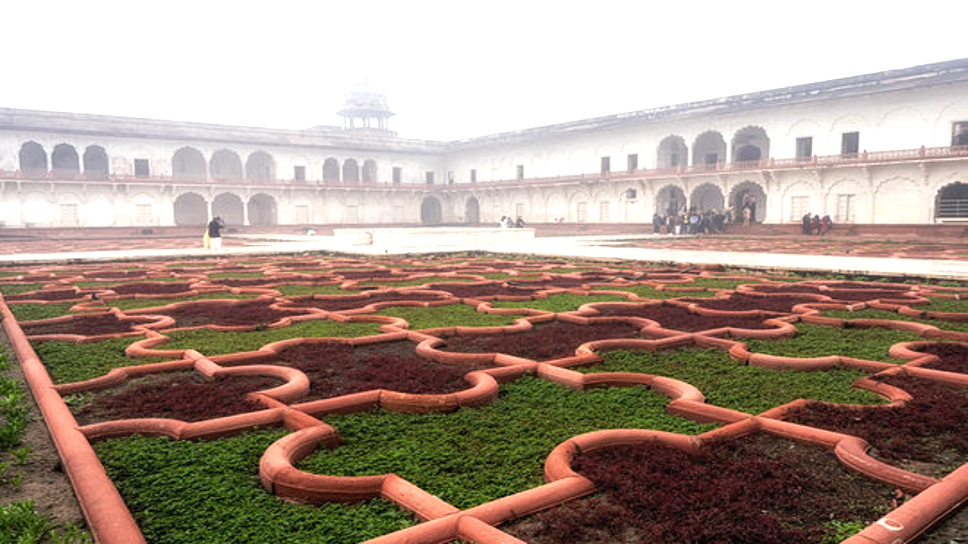 Anguri Bagh Garden at Agra Fort with Tourists Tourists exploring Anguri Bagh garden inside Agra Fort on a misty day