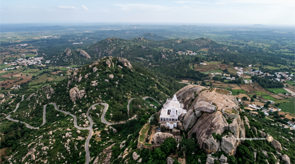 Devarayanadurga: Discover A Breathtaking Spiritual Retreat Devarayanadurga aerial view with white temple for geographical landscape context.